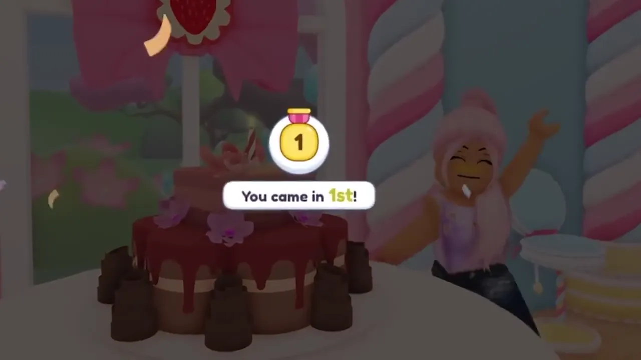 A player beside a chocolate cake with the badge “You came in 1st!” in Cake Off.